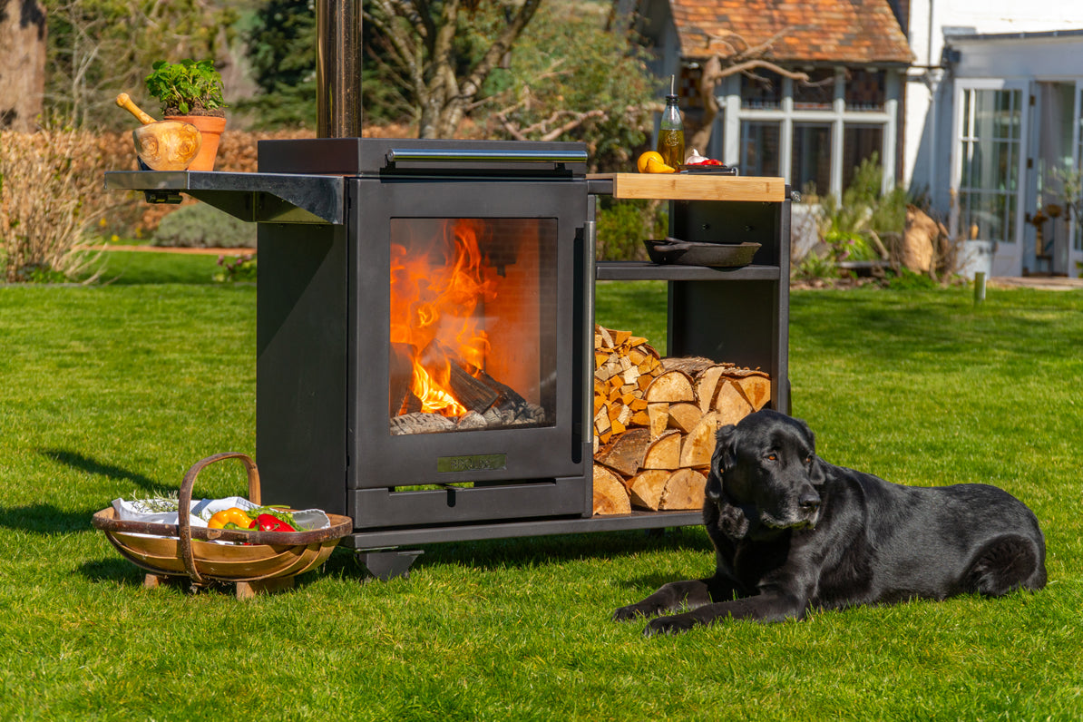 BBQube Log Store alongside BBQube outdoor wood-burning stove and barbecue