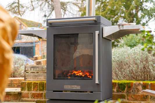 BBQube outdoor wood-burning stove and barbecue with deflector doors closed